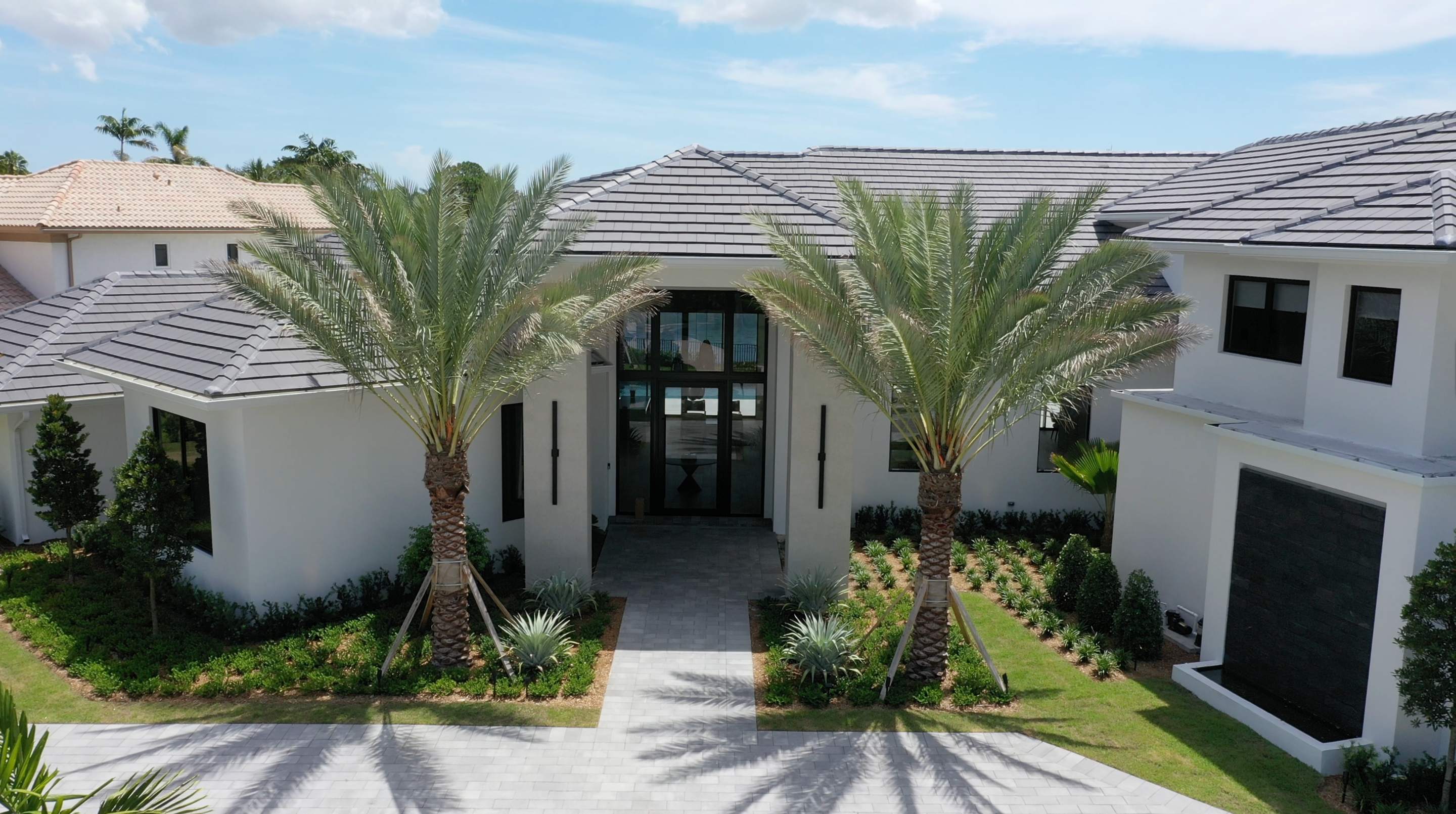 FL Finest Roofing - Luxury Florida home with premium tile roofing