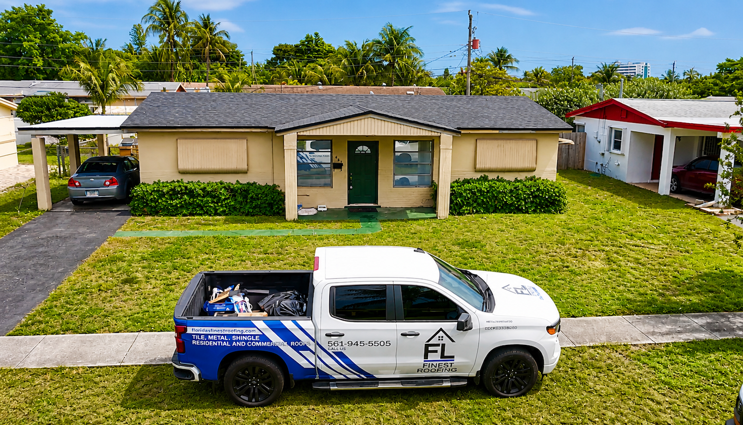 Florida's Finest Roofing truck at residential shingle roof project